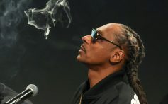 Snoop Dogg blows smoke as he participates in a live episode of the podcast "Drink Champs" at ComplexCon 2024 at the Las Vegas Convention Center on November 16, 2024 in Las Vegas, Nevada.