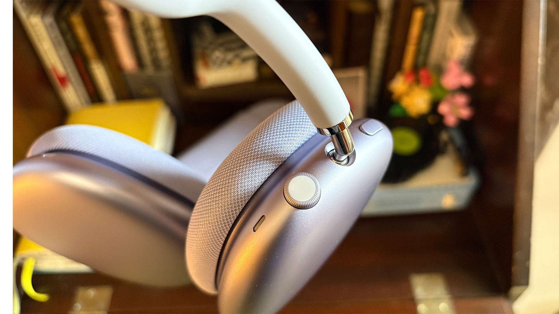 Apple AirPods Max 2 over-ear headphones close up on crown dial on earcup