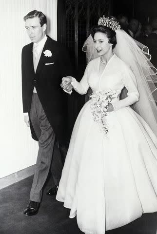 Princess Margaret and her new husband Antony Armstrong-Jones leave Westminister Abbey after their wedding.Credit: Getty