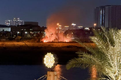 Smoke rises after an explosion at the U.S. Embassy compound in Baghdad, Iraq, following a rocket and drone attack, according to security sources, Tuesday.