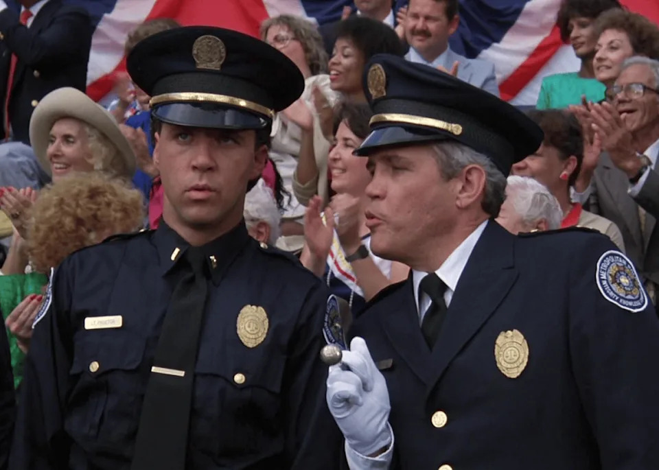 G.W. Bailey and Lance Kinsey in ‘Police Academy 5: Assignment: Miami Beach’. -