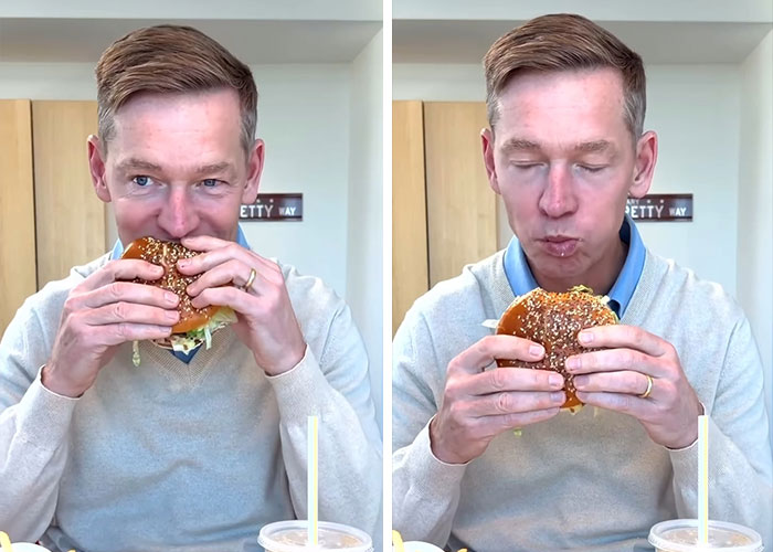 Burger King boss biting into Whopper, wearing light sweater, with a drink on the table, sparking viral CEO burger comparison. Burger King boss biting into Whopper, wearing light sweater, with a drink on the table, sparking viral CEO burger comparison.