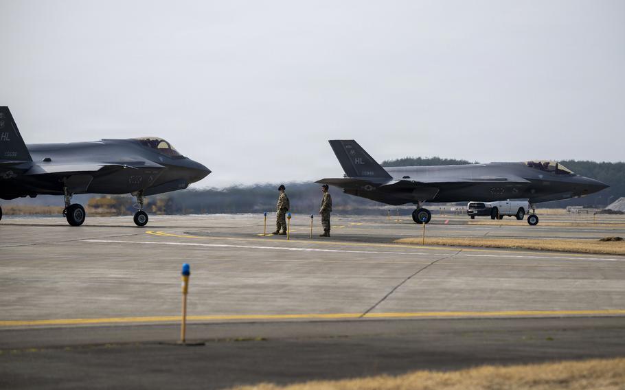 Two U.S. Air Force F-35A Lightning II aircraft taxi on the flightline.