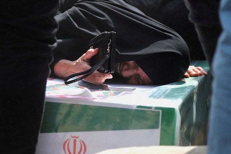 A woman reacts during the funeral of the victims following a reported strike on a school, amid the U.S.-Israeli conflict with Iran, in Minab, Iran, March 3, 2026. Amirhossein Khorgooei/ISNA/WANA (West Asia News Agency) via REUTERS ATTENTION EDITORS - THIS PICTURE WAS PROVIDED BY A THIRD PARTY.      TPX IMAGES OF THE DAY     REFILE – REMOVING ATTRIBUTION TO STRIKE