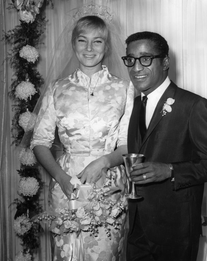 Sammy Davis Jr. and Swedish actor May Britt at their wedding reception in 1960.