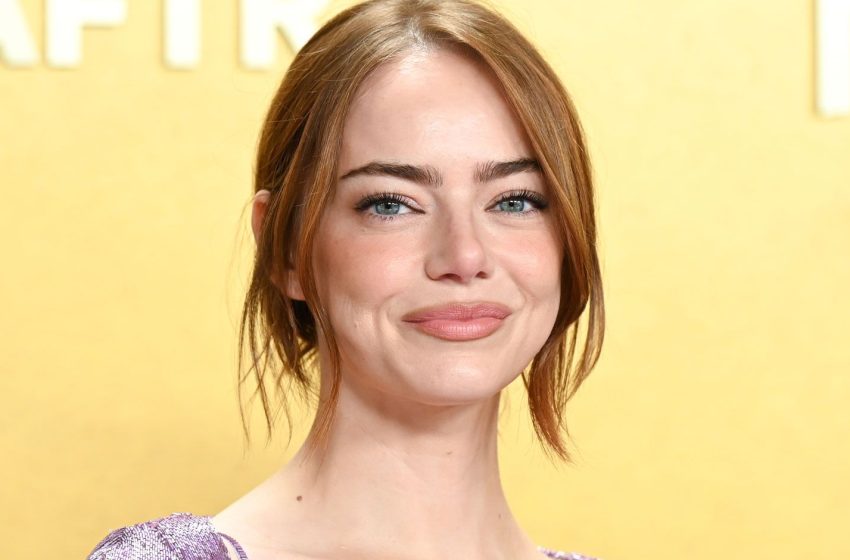  Why Emma Stone’s Red Carpet Cardigan Is Dividing the Internet