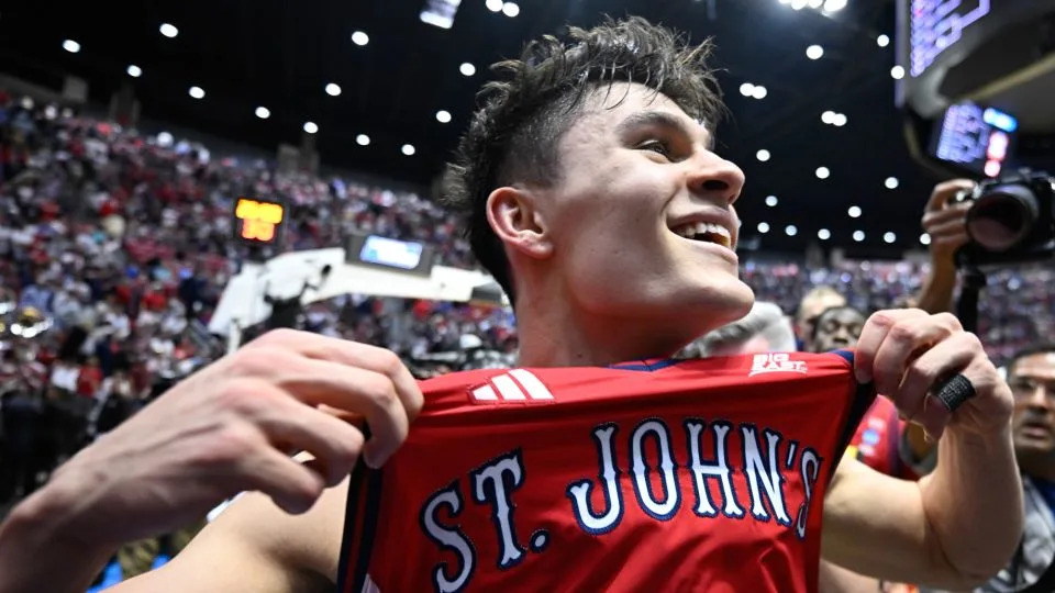 St. John's Red Storm guard Dylan Darling celebrates after defeating the Kansas Jayhawks on a buzzer-beater Sunday. - Denis Poroy/Imagn Images