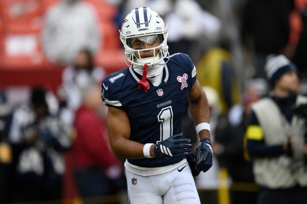 Dallas Cowboys wide receiver Jalen Tolbert (1) warms up before an NFL football game against the Washington Commanders, Thursday, Dec. 25, 2025, in Landover, Md. (AP Photo/Nick Wass)