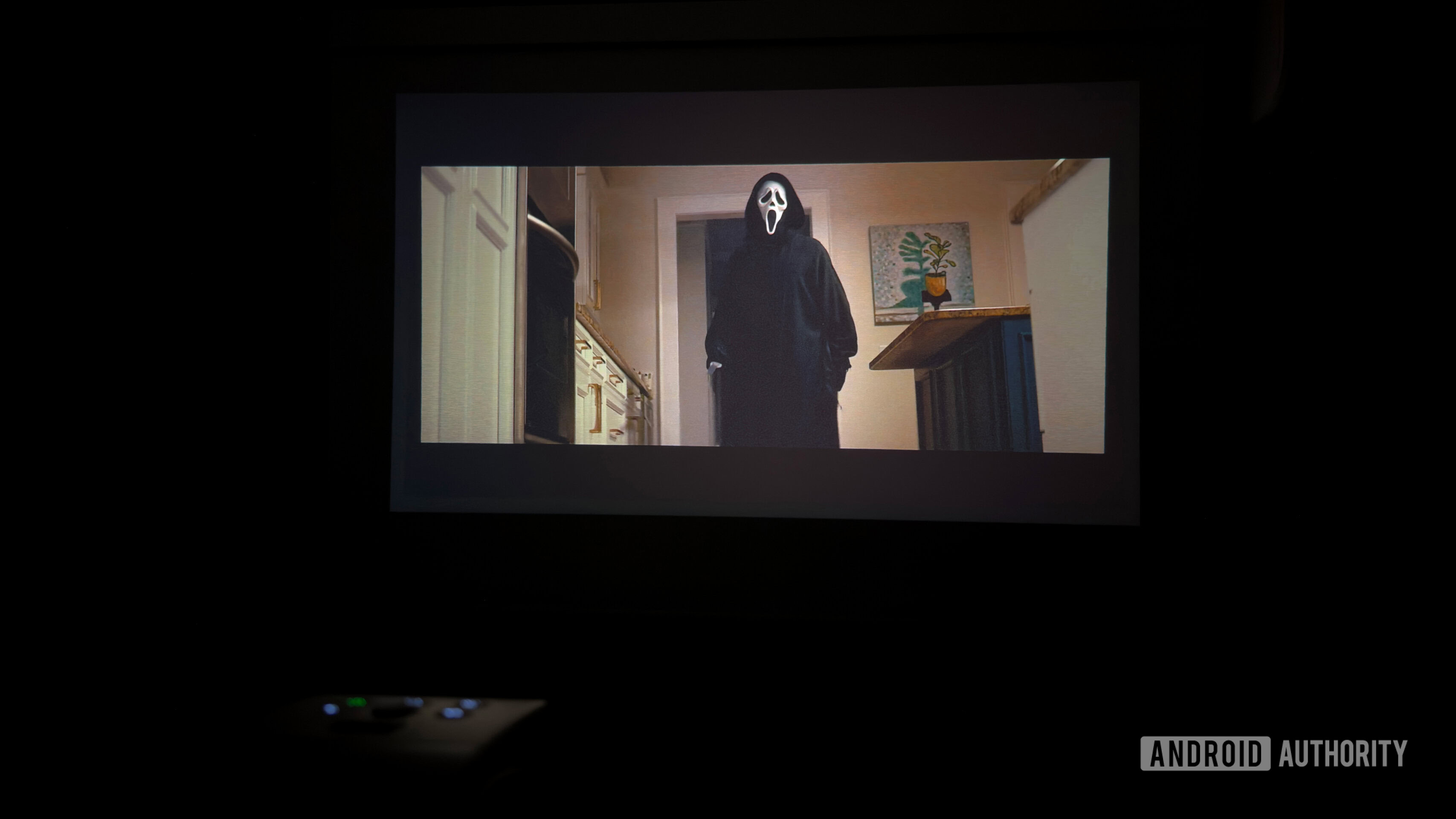 A user watches Scream using a BenQ GV32.