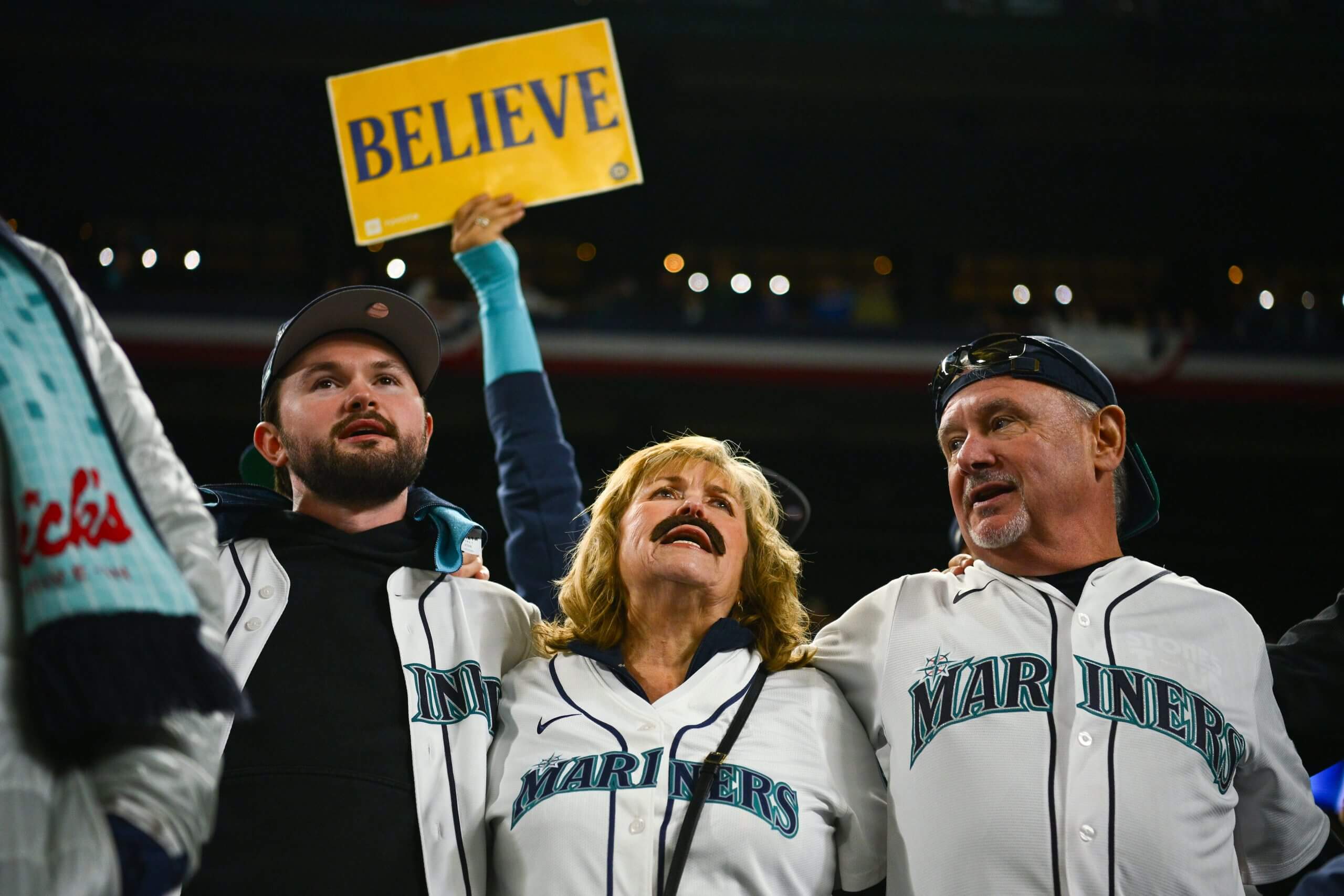 Fans of the Seattle Mariners cheer in the 15th inning during Game Five of the American League Division Series presented by Booking.com between the Detroit Tigers and the Seattle Mariners at T-Mobile Park on Friday, October 10, 2025 in Seattle, Washington. 
