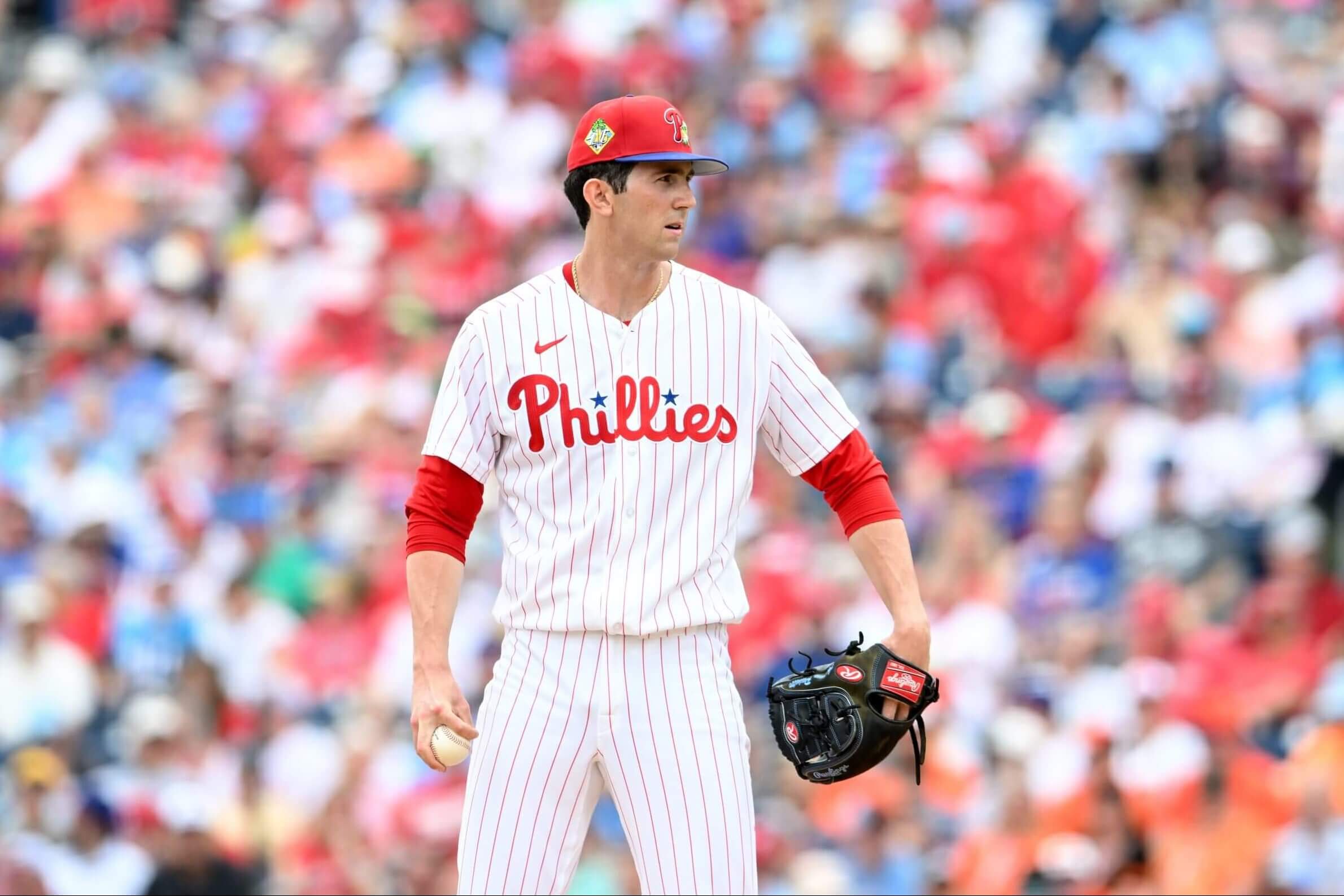 Andrew Painter #76 of the Philadelphia Phillies prepares to pitch during the second inning of a spring training game against the Baltimore Orioles at BayCare Ballpark on March 13, 2026 in Clearwater, Florida. 