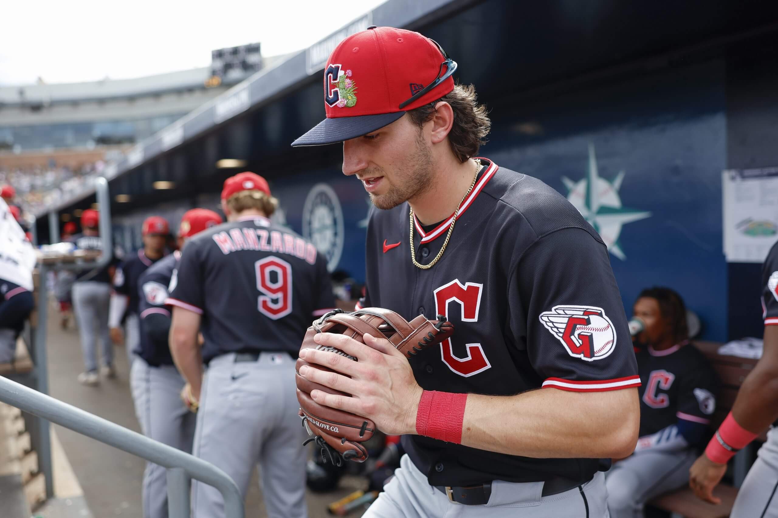 Chase DeLauter #24 of the Cleveland Guardians takes the field during a Spring Training game against the San Diego Padres at Peoria Stadium on March 14, 2026 in Peoria, Arizona. 