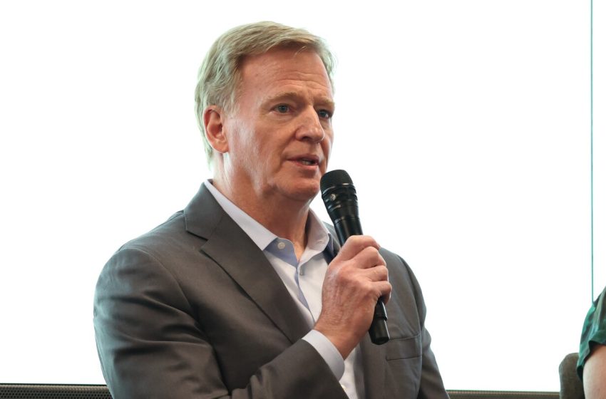  NFL Commissioner Roger Goodell congratulates new NFLPA executive director JC Tretter