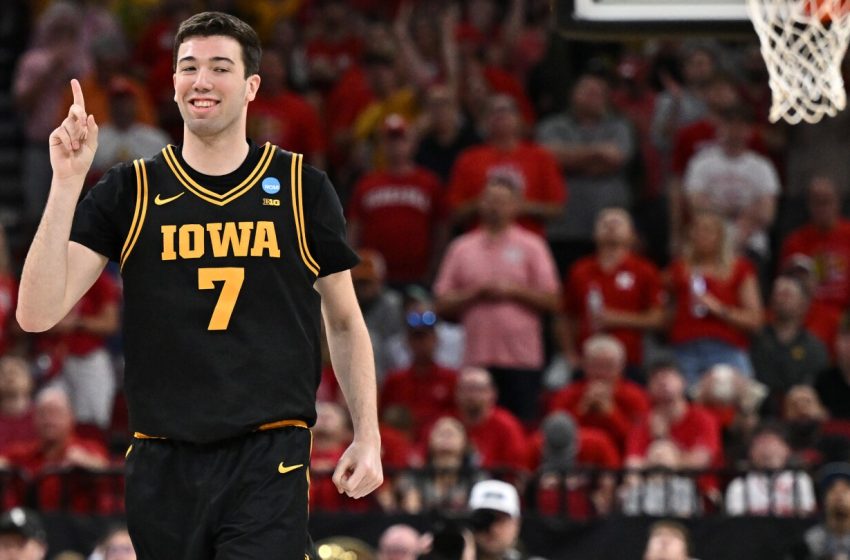  Ninth-seeded Iowa continues improbable March run, beating Nebraska 77-71 to reach Elite Eight
