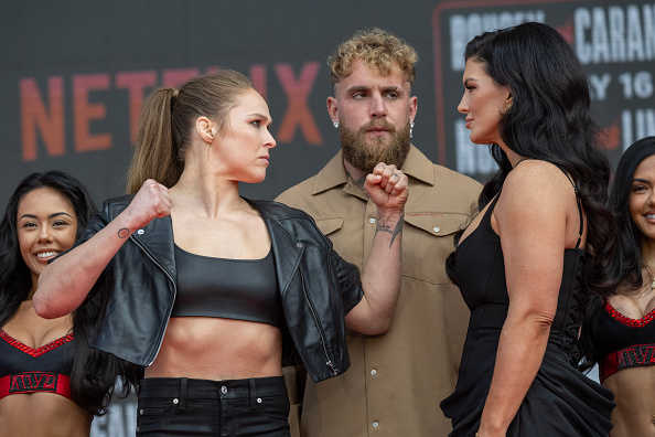  Ronda Rousey Drags UFC Corporate Image While Standing Beside Gina Carano