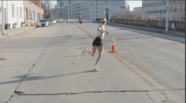 Jess McClain realizes she has run off course after being in the lead with about a mile to go in the  U.S. Half Marathon Championships on Sunday.