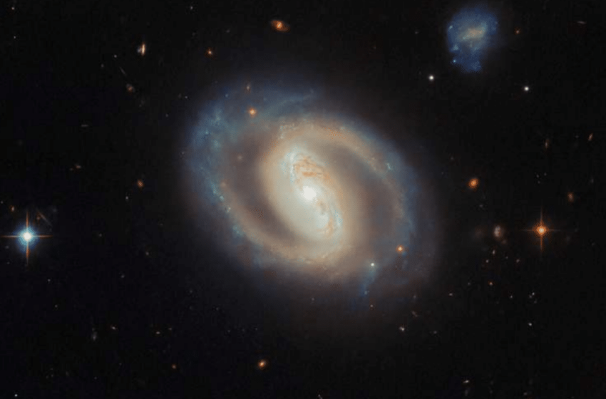  Stunning Hubble Image Reveals the Birthplace of Stars in the Barred Spiral Galaxy IC 486