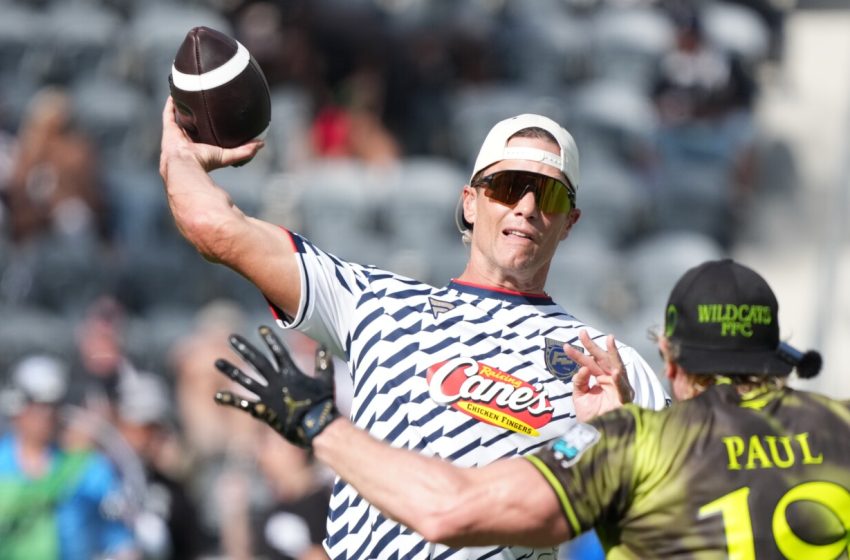  Tom Brady drops a hint after a day of tossing dimes