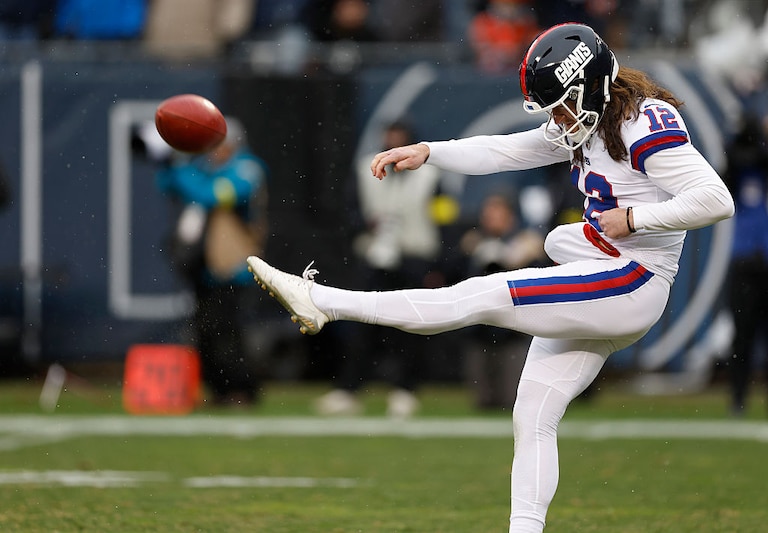 Former New York Giants punter Jamie Gillan punts the ball against the Chicago Bears in Week 10.
