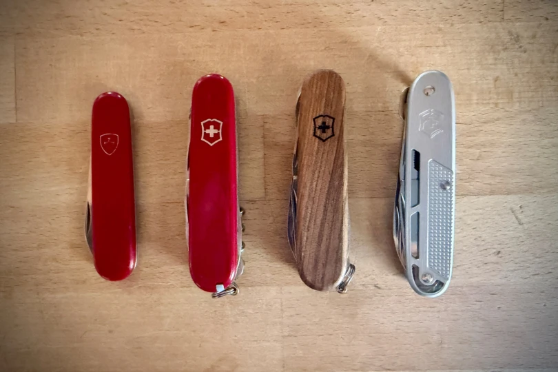 Victorinox Synergy X Alox shown alongside several other Swiss Army Knife models
