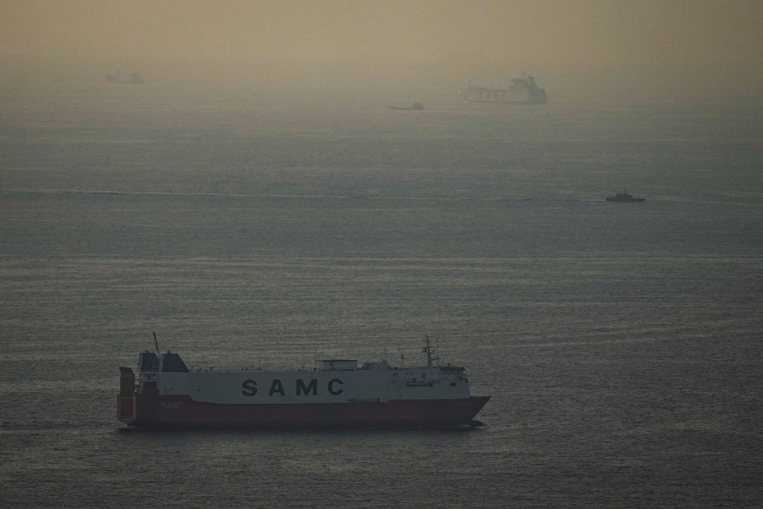 Cargo ships sail in the Arabian Gulf towards the Strait of Hormuz in the United Arab Emirates, Thursday, March 19, 2026.