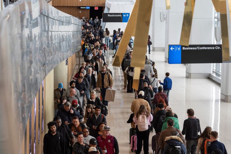 Travelers line up at a TSA checkpoint on Wednesday, March 25, 2026 at LaGuardia Airport in New York. (AP Photo/Yuki Iwamura)