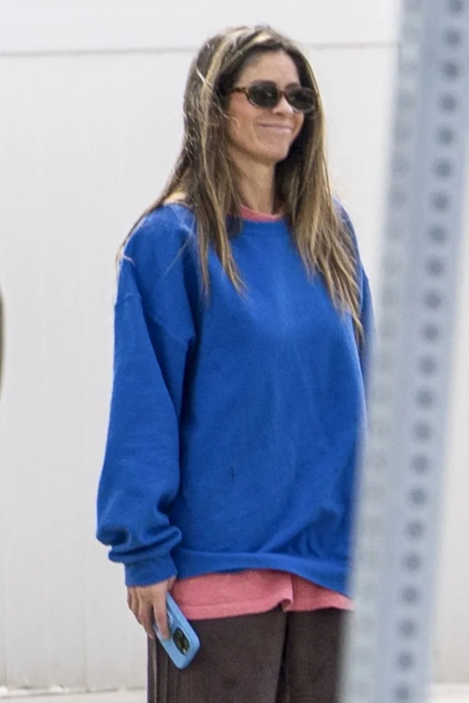 She grinned seemingly unapologetically when caught by cameras. BACKGRID