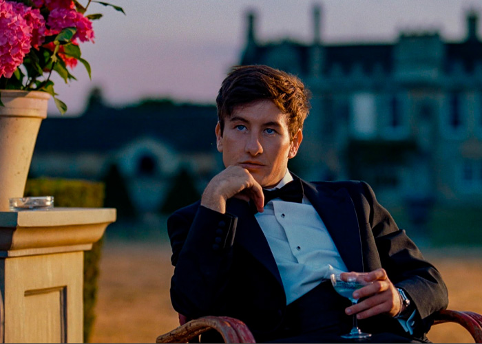 Barry Keoghan dressed in tuxedo, seated outdoors at dusk, reflecting his acting career amid fan backlash. Barry Keoghan dressed in tuxedo, seated outdoors at dusk, reflecting his acting career amid fan backlash.