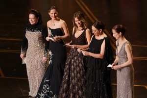HOLLYWOOD, CALIFORNIA - MARCH 15: (L-R) Melissa McCarthy, Rose Byrne, Kristen Wiig, Maya Rudolph, and Ellie Kemper speak onstage during the 98th Oscars at Dolby Theatre on March 15, 2026 in Hollywood, California. (Photo by Kevin Winter/Getty Images)