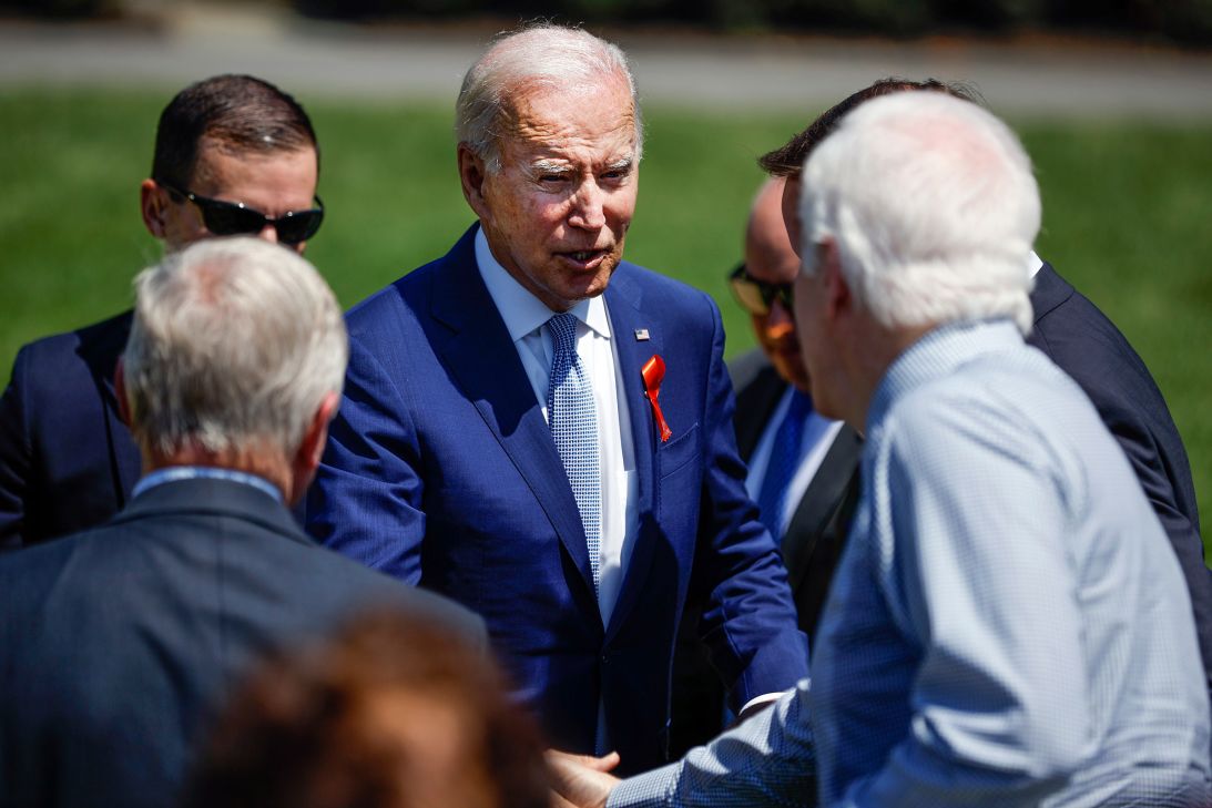 President Joe Biden greets lawmakers including Sen. John Cornyn after delivering remarks at an event to celebrate gun-safety legislation at the White House on July 11, 2022.