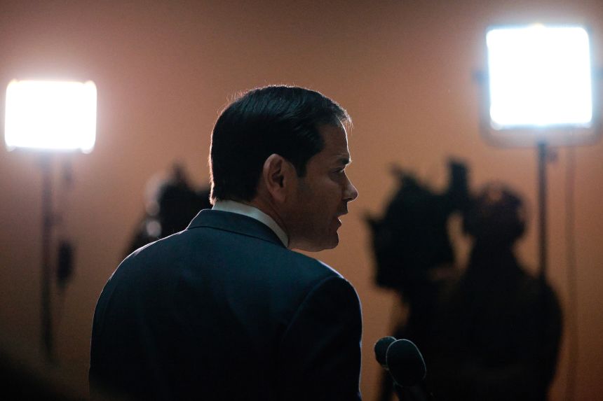 Secretary of State Marco Rubio talks to reporters at the US Capitol before briefing the 