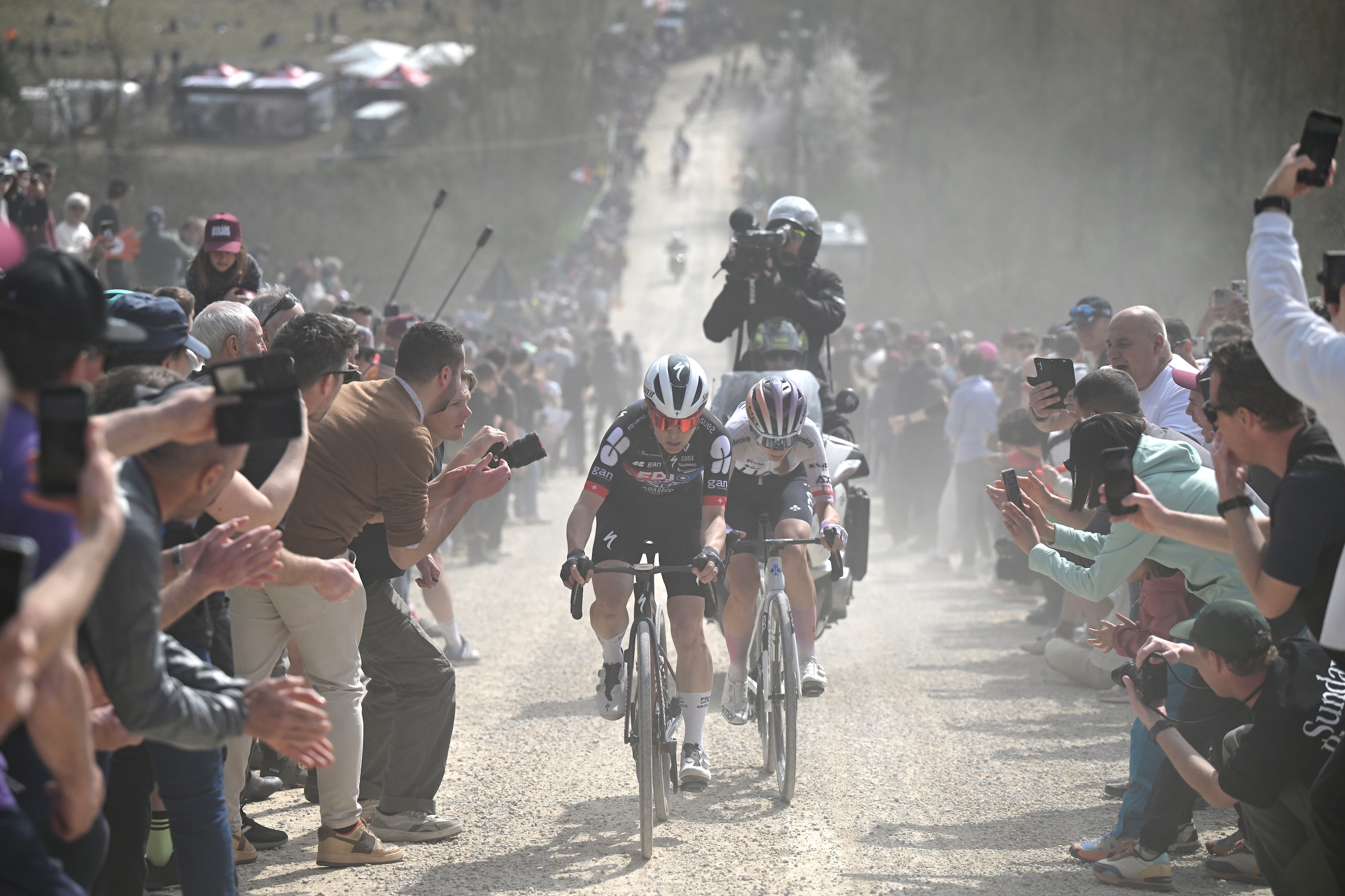 SIENA, ITALY - MARCH 07: (L-R) Elise Chabbey of Switzerland and Team FDJ United - SUEZ and Dominika Wlodarczyk of Poland and UAE Team ADQ compete in the breakaway during to the 12th Strade Bianche Donne 2026 a 133km one day race from Siena to Siena / #UCIWWT / on March 07, 2026 in Siena, Italy. (Photo by Luc Claessen/Getty Images)