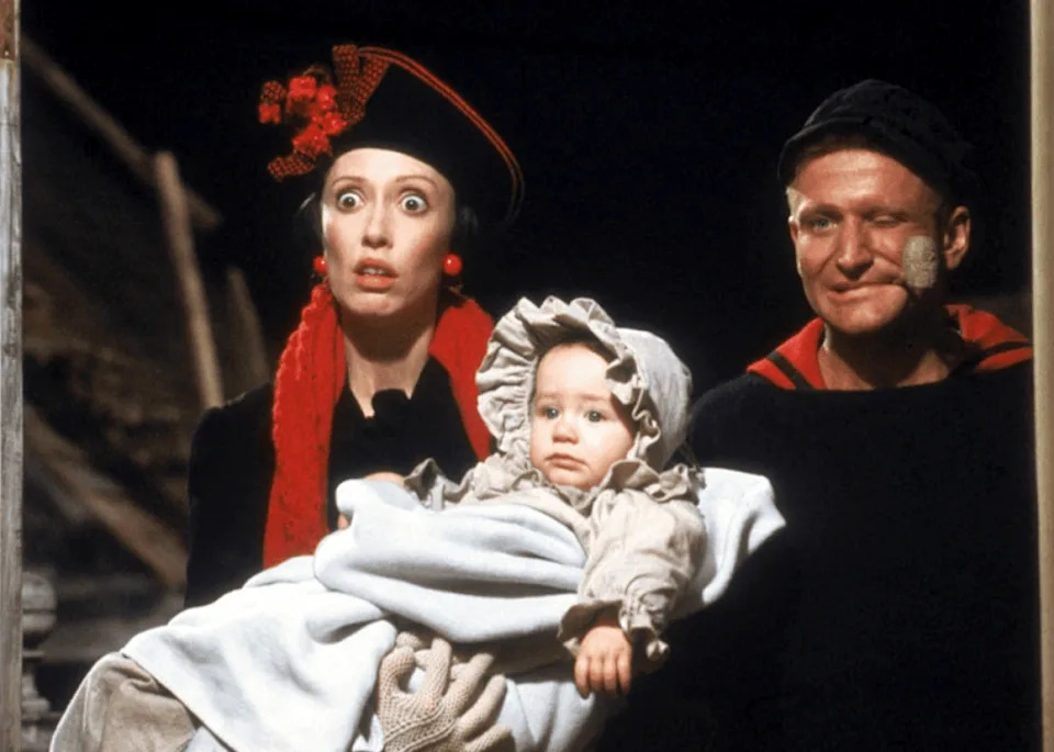 Robin Williams, Shelley Duvall, and Wesley Ivan Hurt in ‘Popeye’. -