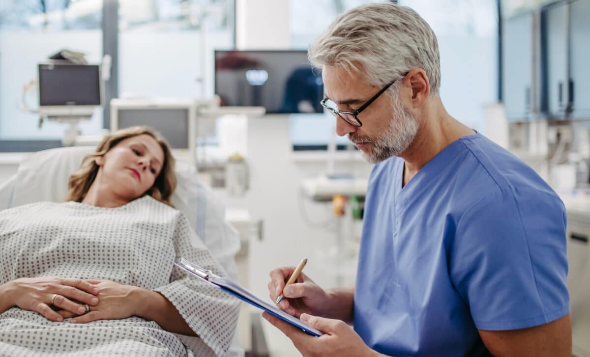 Doctor Speaking With A Patient