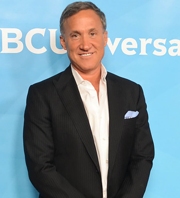 Dr. Terry Dubrow in a black suit posing at an event, known for his medical verdict on Jim Carrey’s face controversy. Dr. Terry Dubrow in a black suit posing at an event, known for his medical verdict on Jim Carrey’s face controversy.