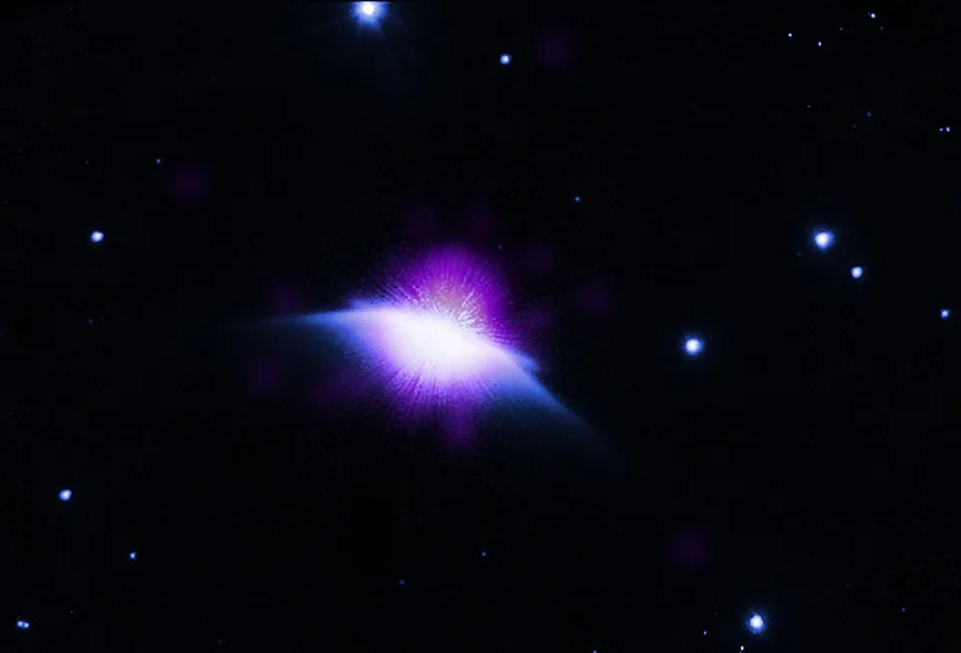 Purple light streams off a a white star in space