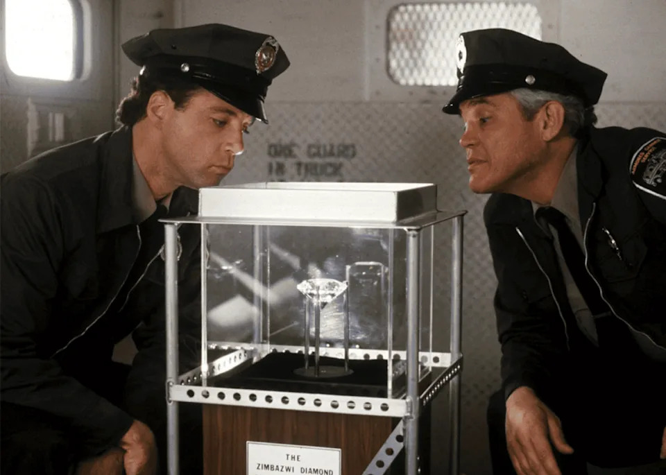 G.W. Bailey and Lance Kinsey in ‘Police Academy 6: City Under Siege’. -