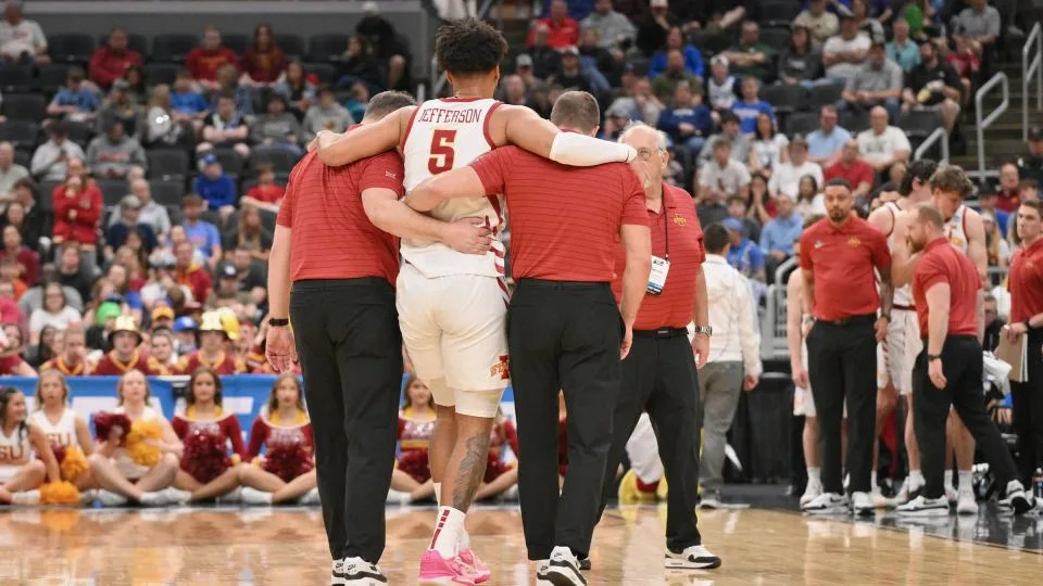 Iowa State Cyclones forward Joshua Jefferson (5) is helped off of the court after suffering an apparent injury to his left leg against Tennessee State Tigers on Friday. - Jeff Curry/Imagn Images/Reuters