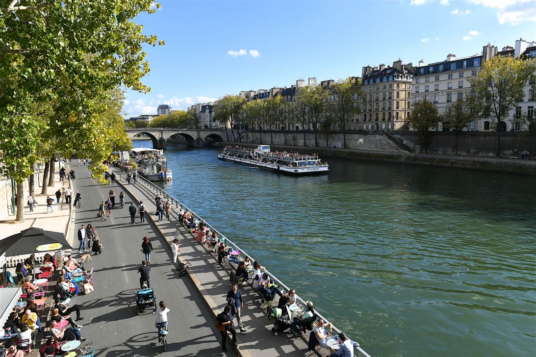 Once busy with traffic, a roadway by the Seine is now a pedestrian thoroughfare.