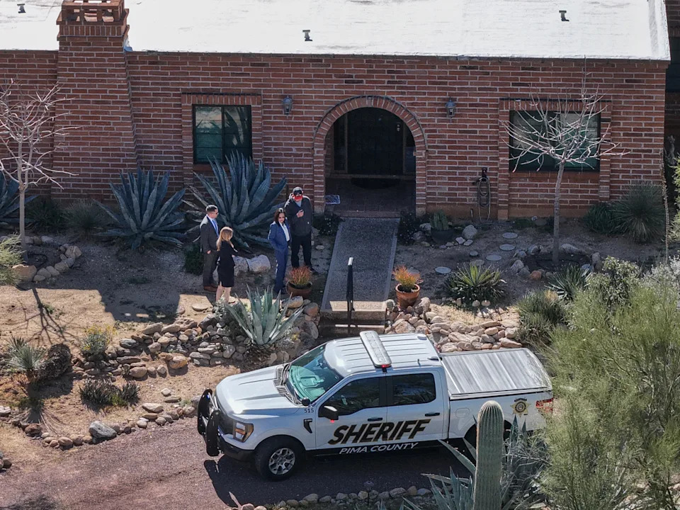 Law enforcement officials visit Nancy Guthrie's residence in Tucson, Ariz.