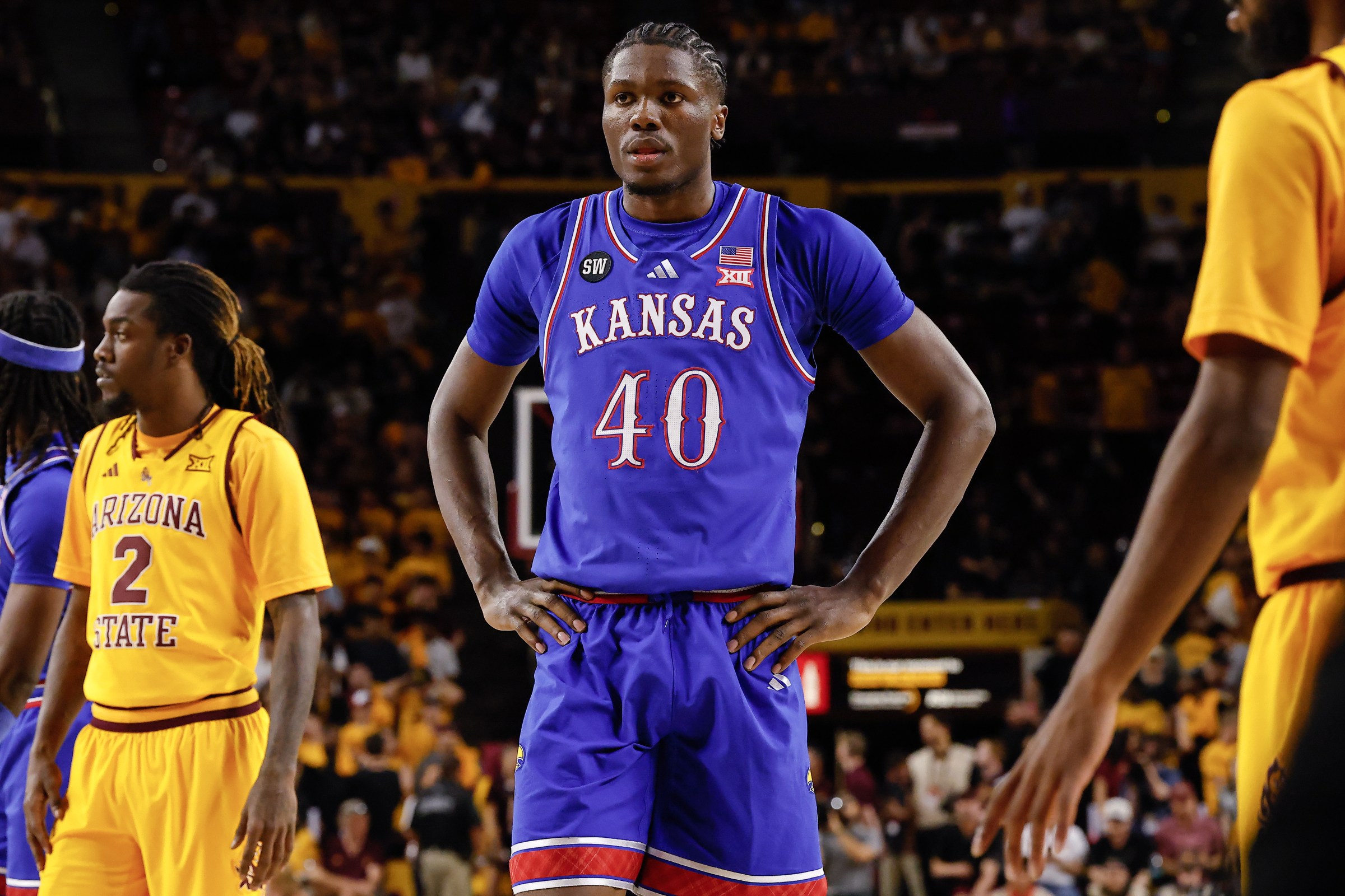 TEMPE, AZ - MARCH 3: Kansas Jayhawks forward Flory Bidunga (40) looks on during the college basketball game between the Kansas Jayhawks and the Arizona State Sun Devils on March 3, 2026 at Desert Financial Arena in Tempe, Arizona. (Photo by Kevin Abele/Icon Sportswire via Getty Images)