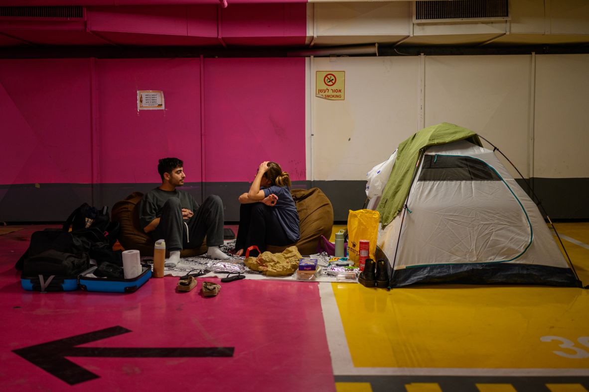 People prepare to spend the night sleeping in an underground shelter in Tel Aviv, Israel, on February 28.