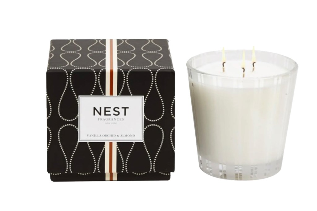 Nest Fragrances Vanilla Orchid & Almond candle in its black and white patterned box, and the unlit candle in a clear glass jar.