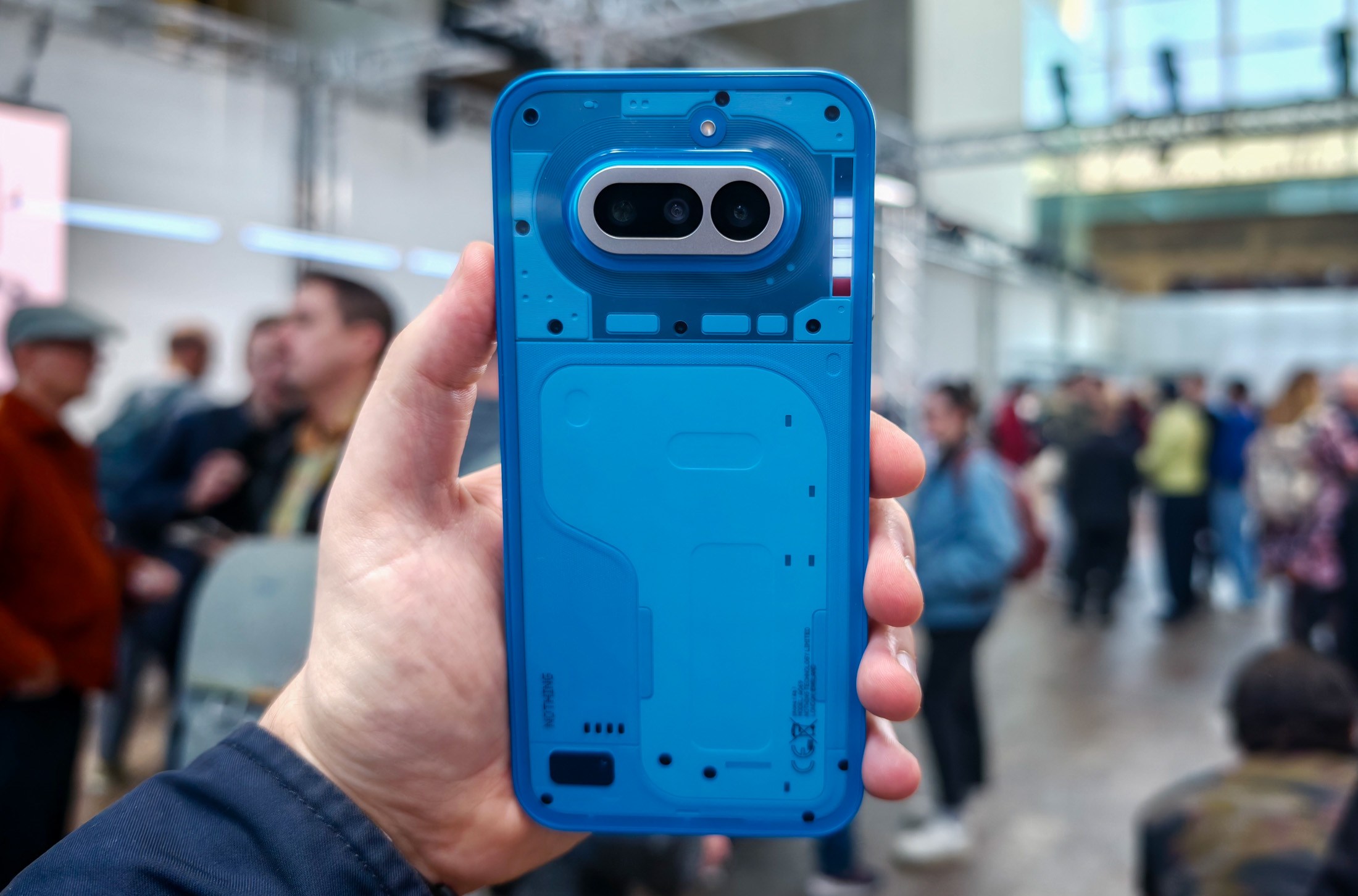 Photo of Nothing Phone 4A in blue at London launch event