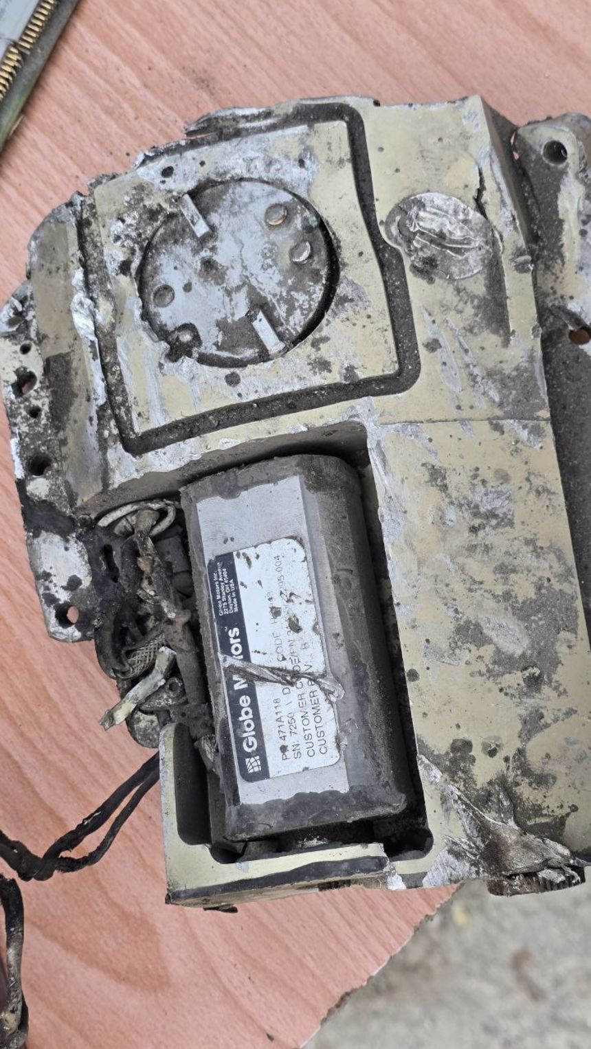 This fragment, identified by CNN as an actuator motor used to steer a Tomahawk missile, is marked with “Made in USA” and the name of Ohio-based munitions manufacturer Globe Motors.