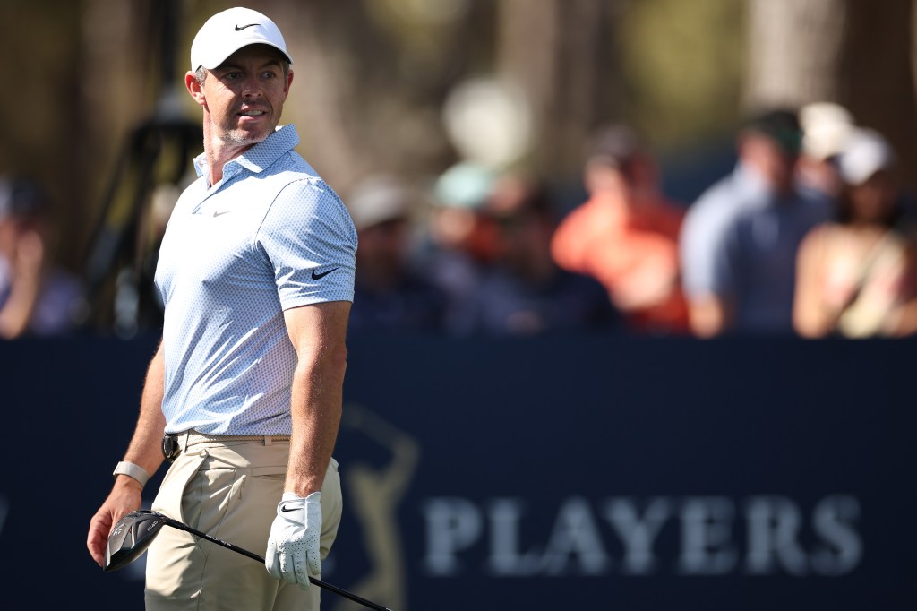 Rory McIlroy of Northern Ireland watches his shot from the 12th tee during the final round of The Players Championship 2026.