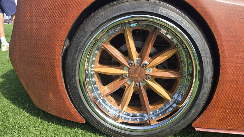 A closeup of the wheel with center section made of wood