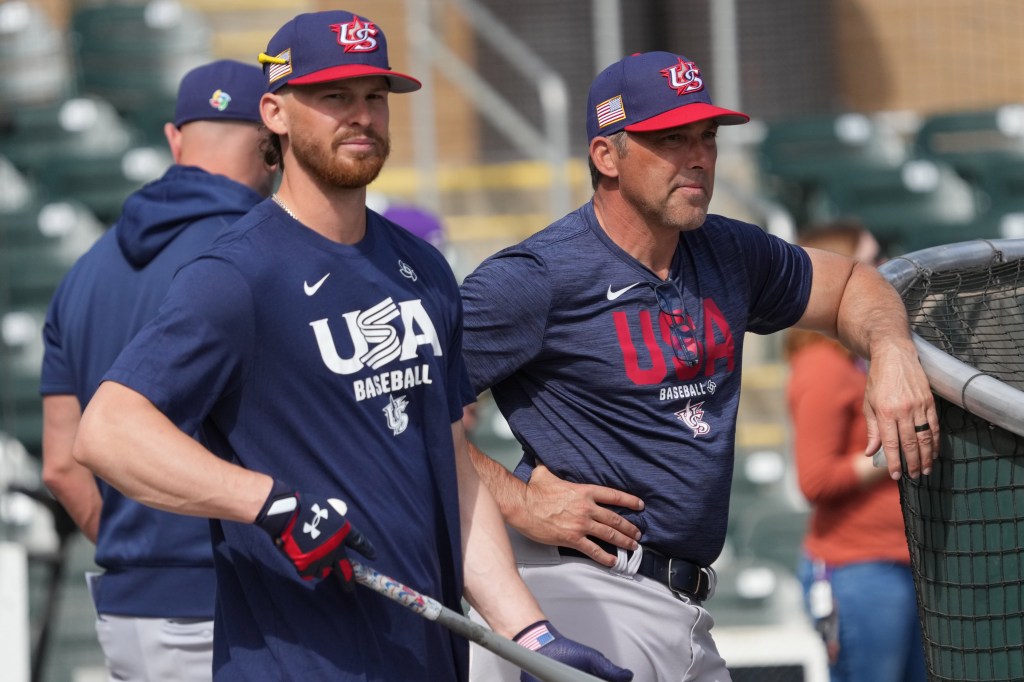 United States shortstop Bobby Witt Jr. (7) and Manager Mark DeRosa before a game against the Colorado Rockies at Salt River Fields. 