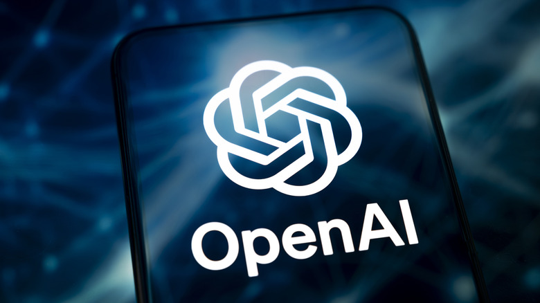 OpenAI logo displayed on a screen