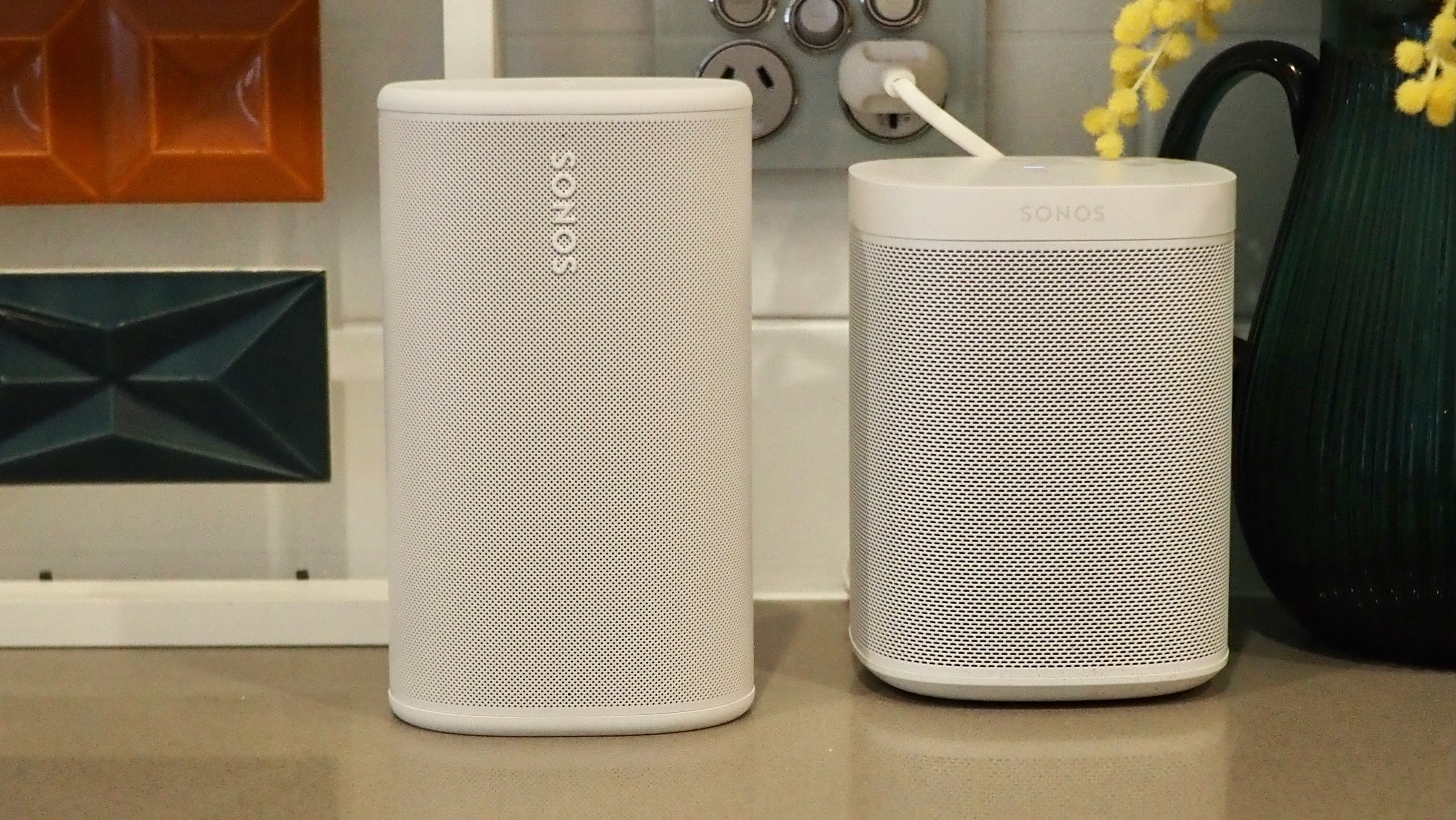 Sonos Play speaker next to a Sonos One SL